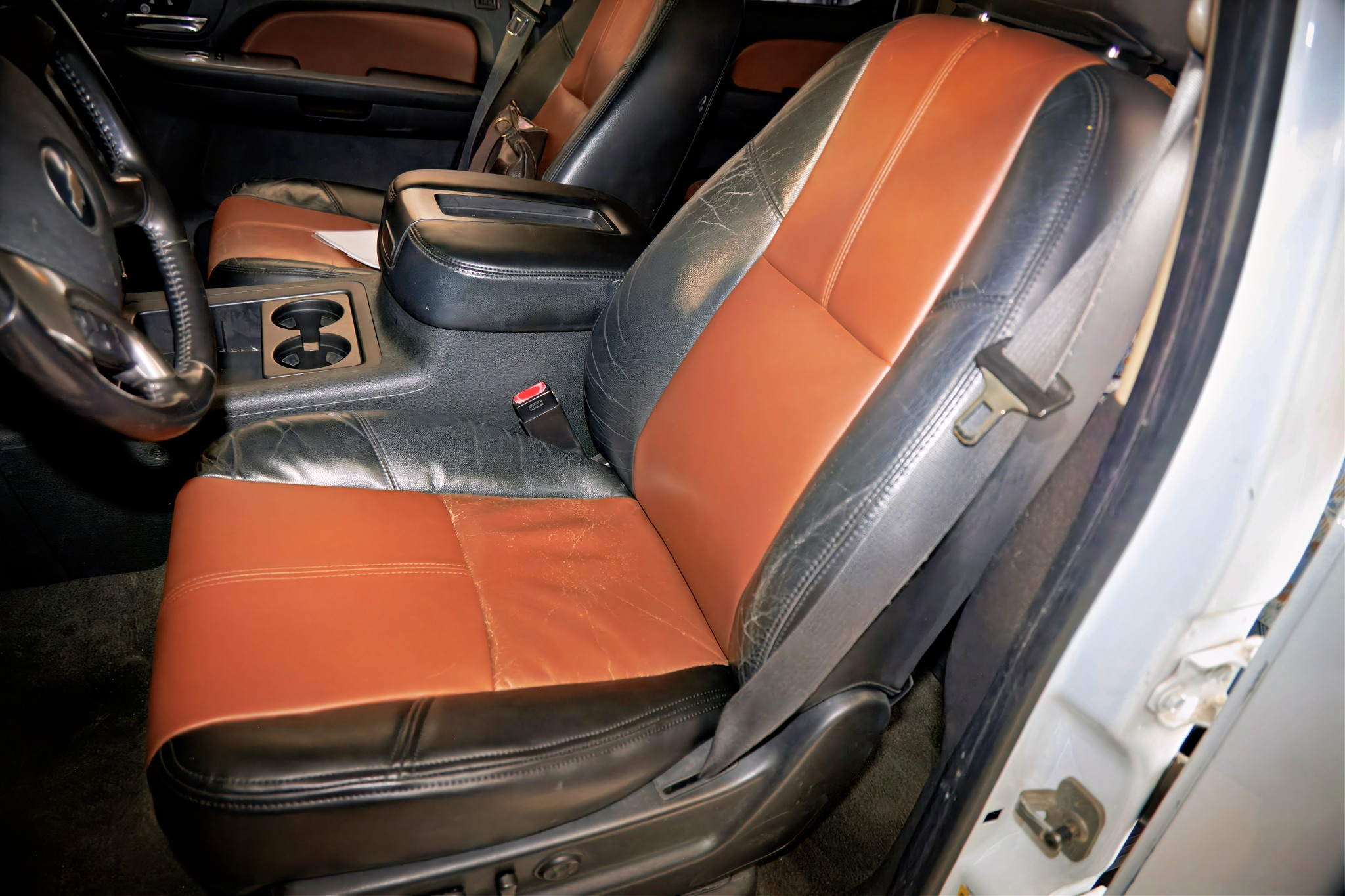 Stitchmasters Upholstery repaired both the driver and the passenger seats at no charge!