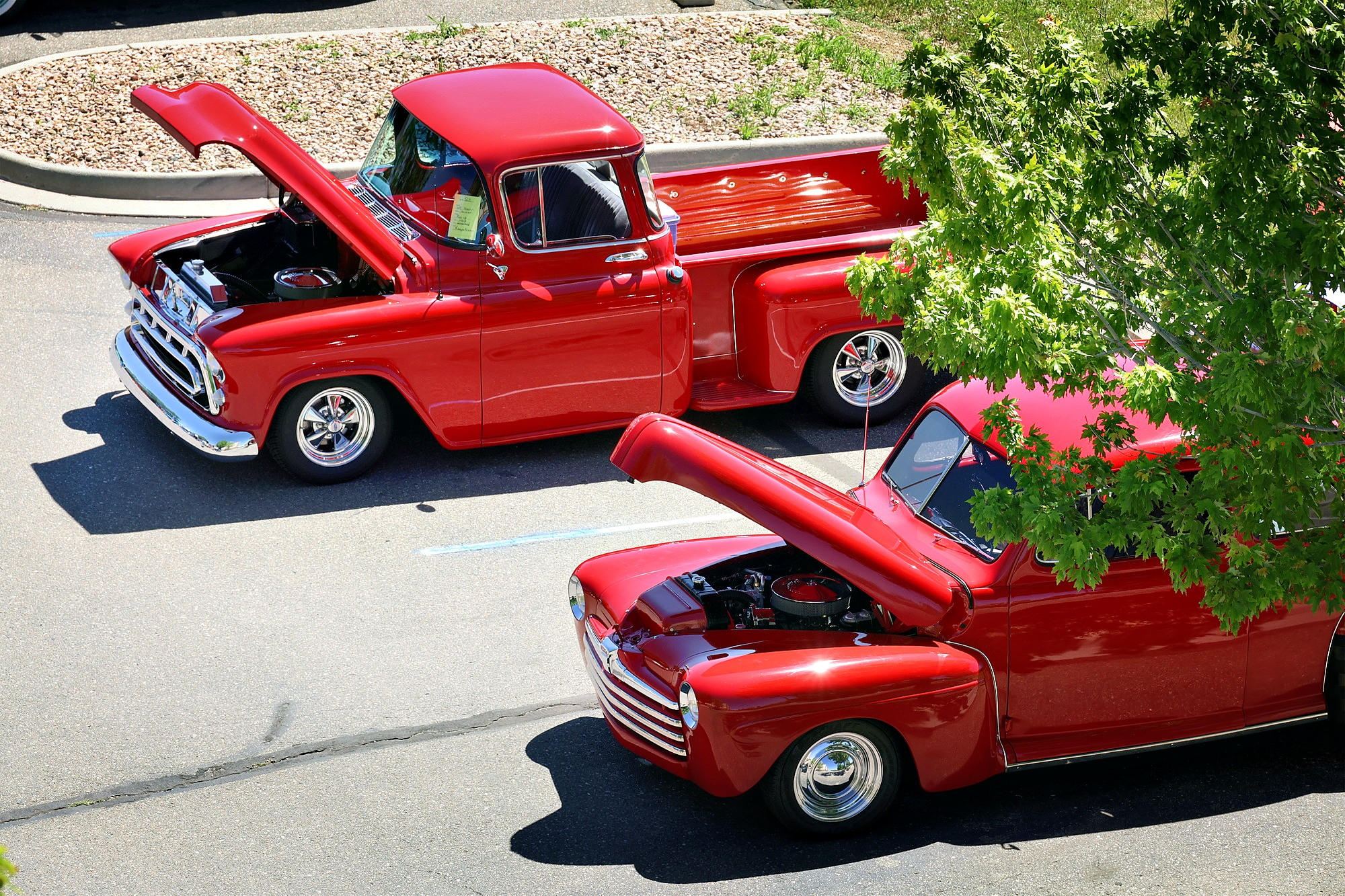 Rooftop shot of red trucks